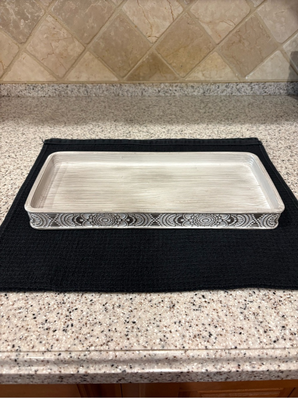 BINO Maison Collection tray is made of a grey, marble-patterned material. - Picture 1 of 7